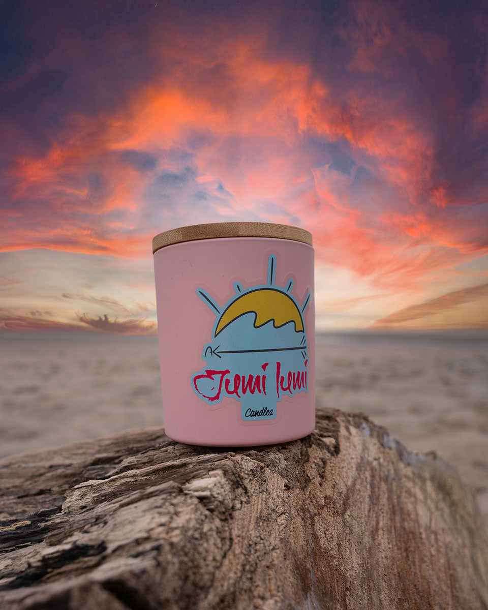 Pink Pearl Candle On Driftwood.